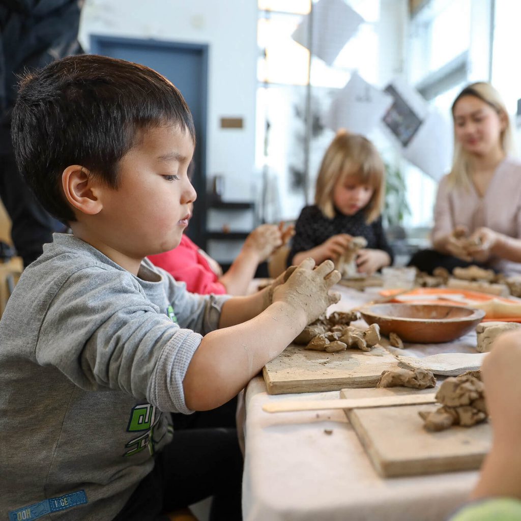 child at craft class